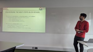 Hamed presenting his research