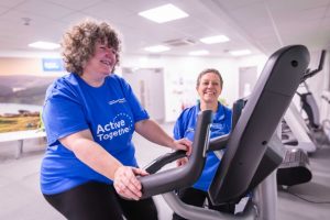 Woman on exercise bike