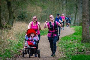 Two women and a child at parkrun